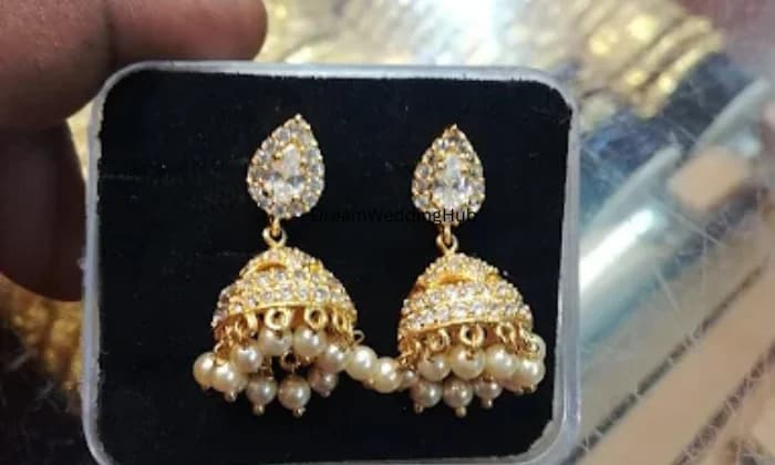 AJ JOTHI GOLD COVERING AJ JOTHI GOLD COVERING